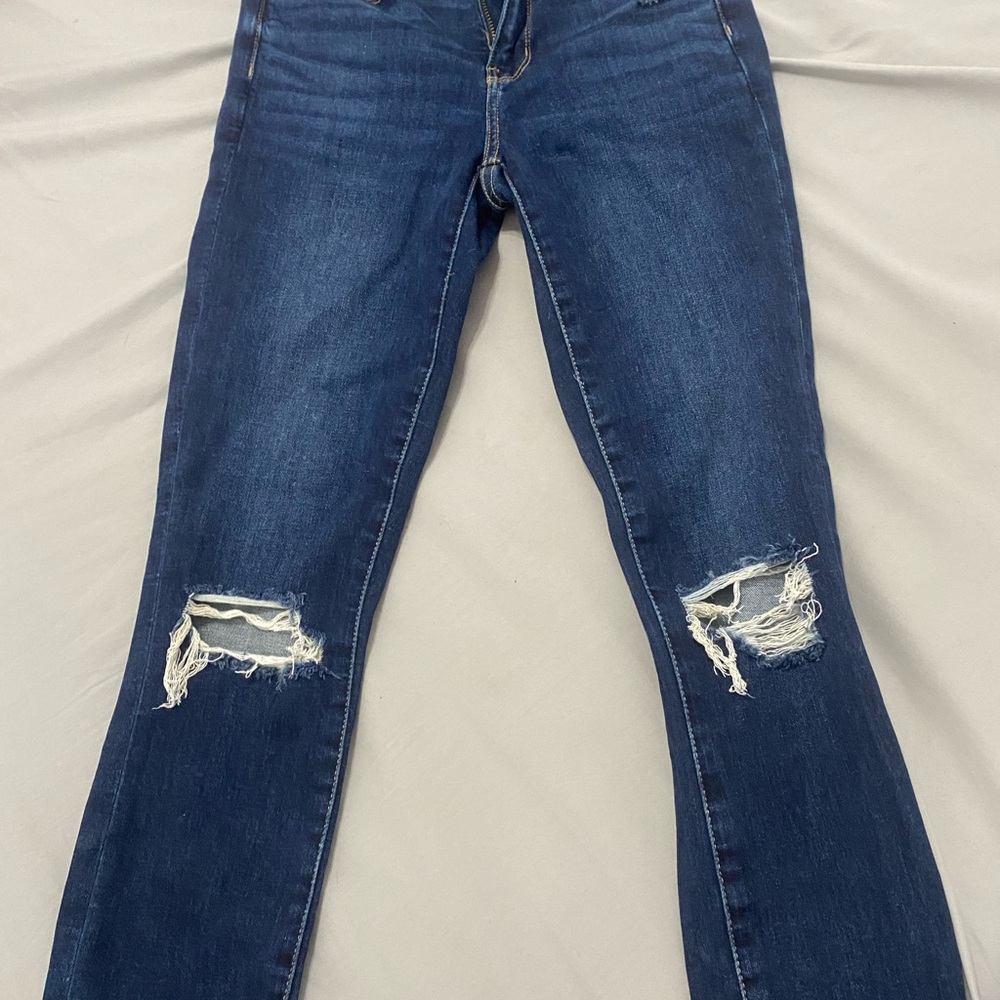 Women's Distressed Blue Jeans